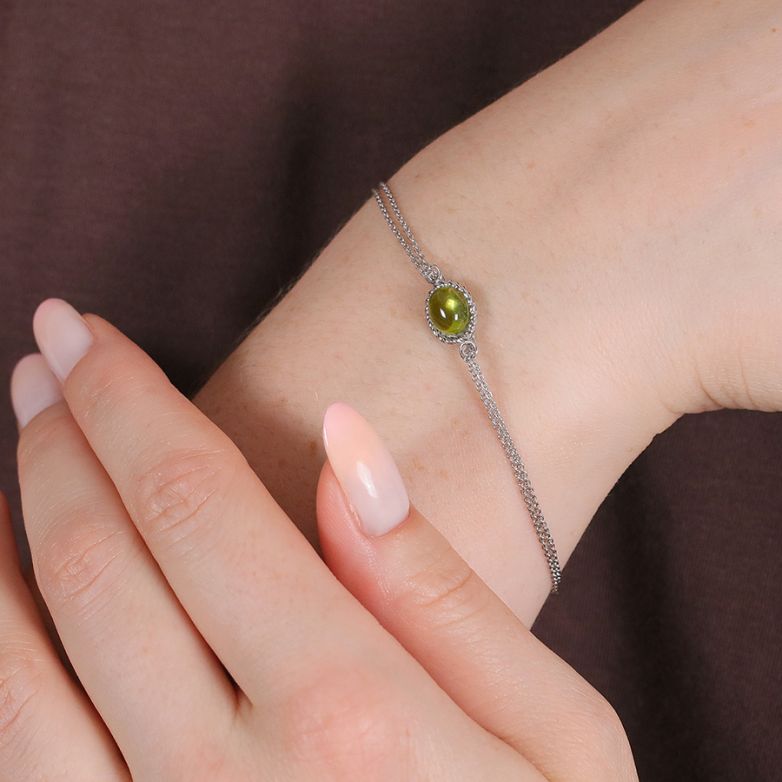 1.70-carat cabochon peridot...
