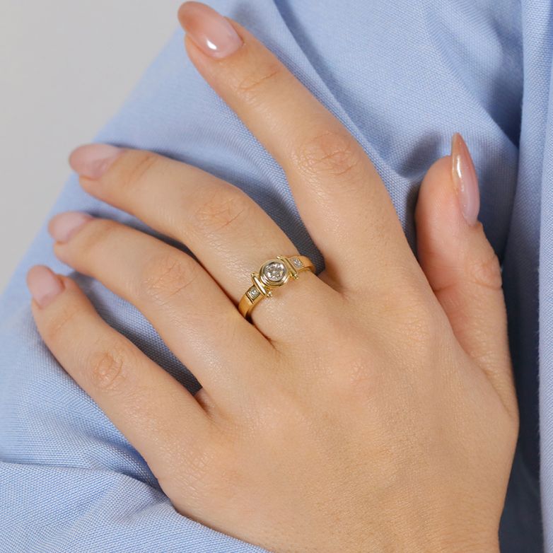 0.22-carat diamond ring,...