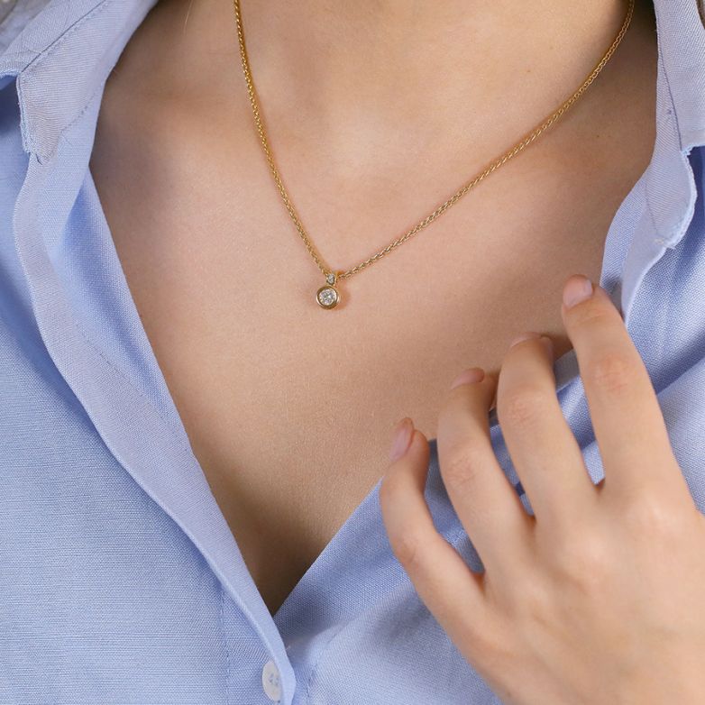 0.28-carat diamond necklace...