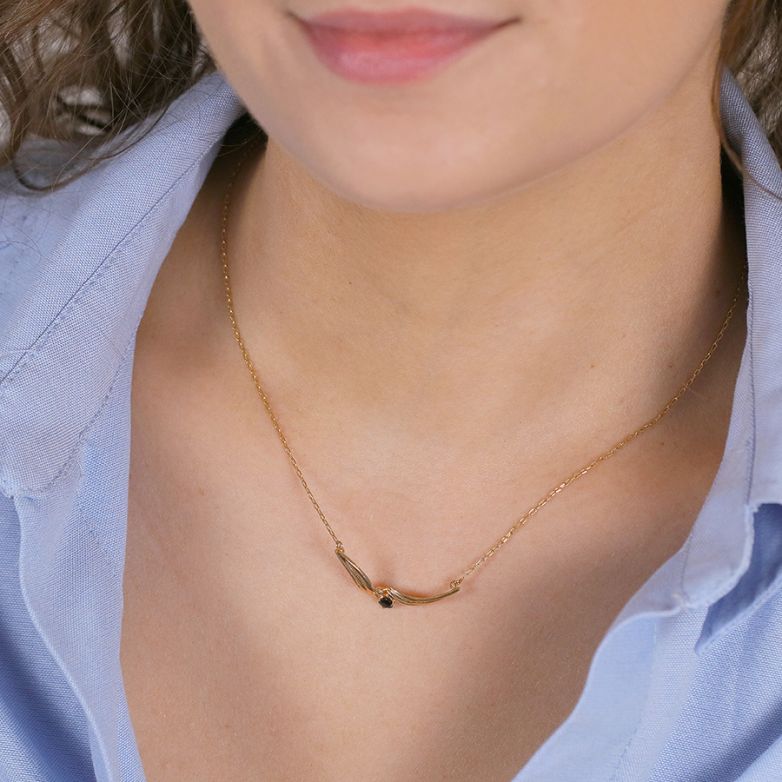 Necklace with a 0.16-carat...