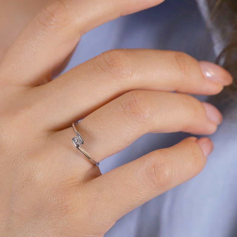 0.06-carat diamond...