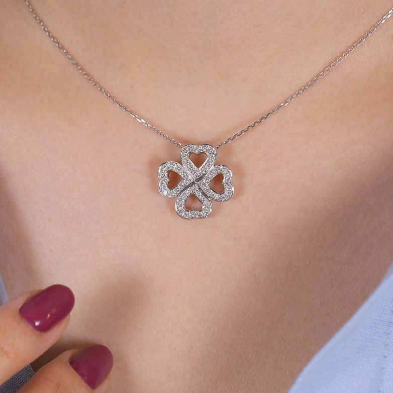 0.48-carat diamond clover...
