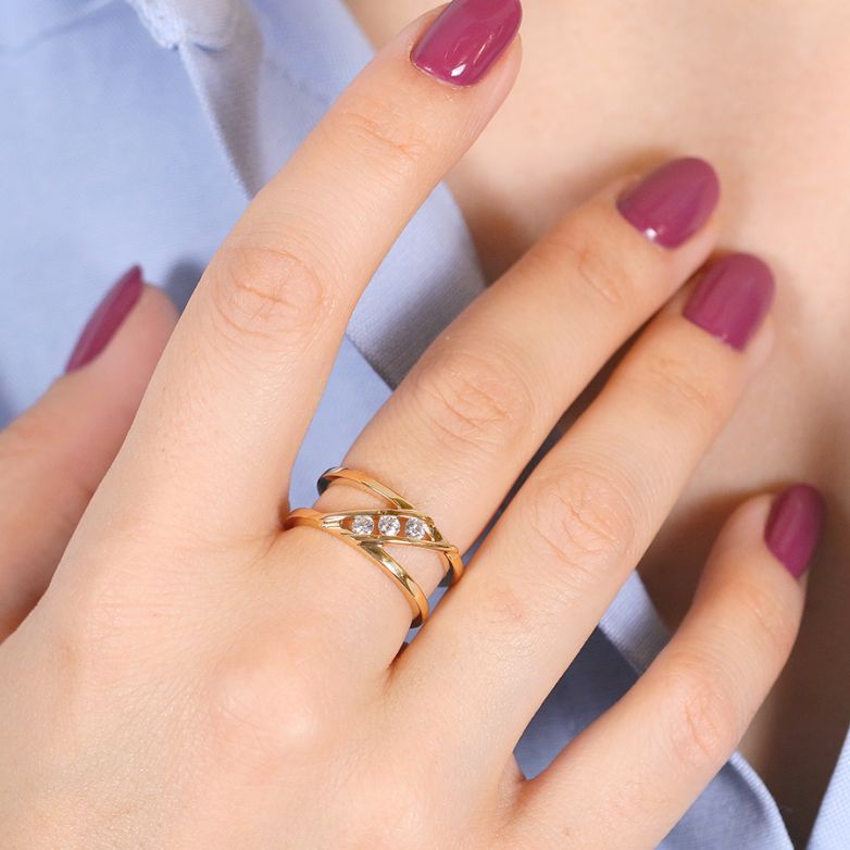 0.18-carat diamond ring,...
