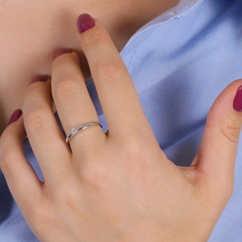 0.10-carat diamond...