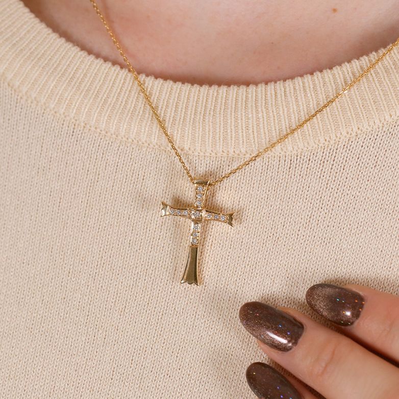0.008-carat diamond cross,...