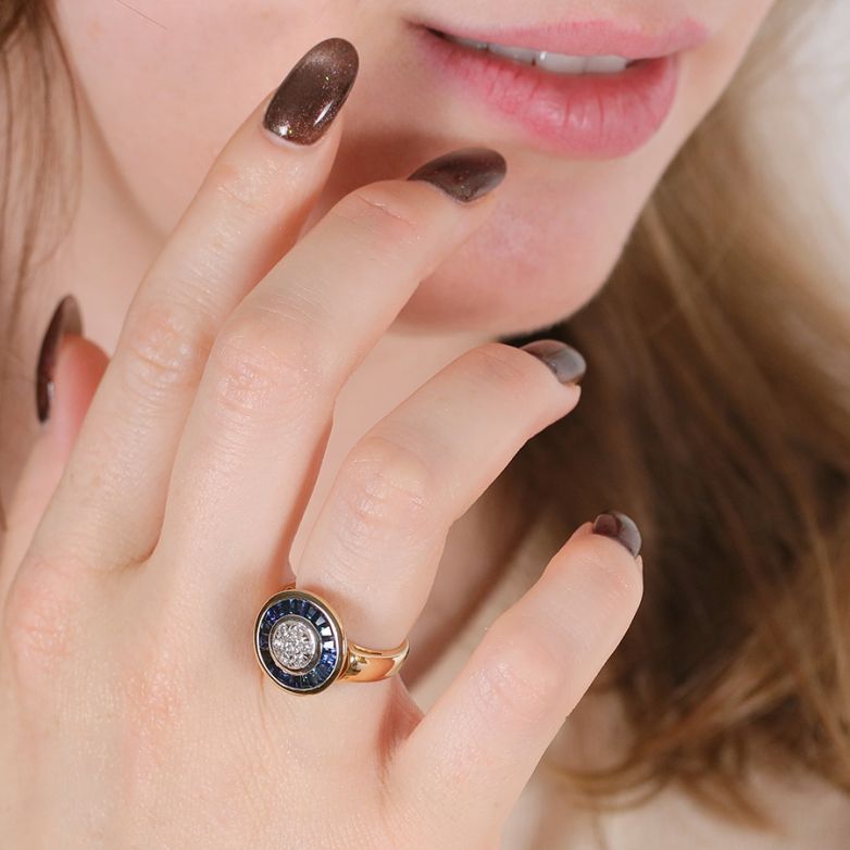0.54-carat sapphire and...