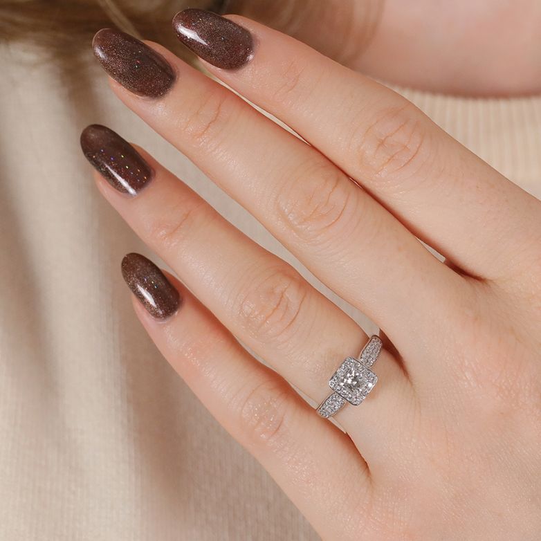 0.76-carat diamond ring,...