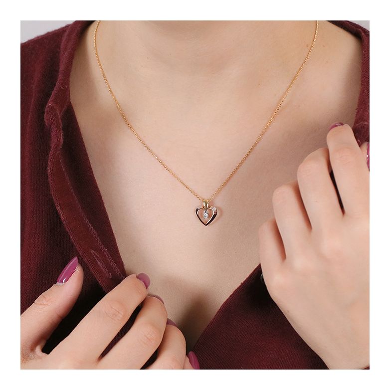 0.06-carat diamond heart...