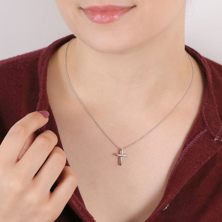 0.02-carat diamond cross...