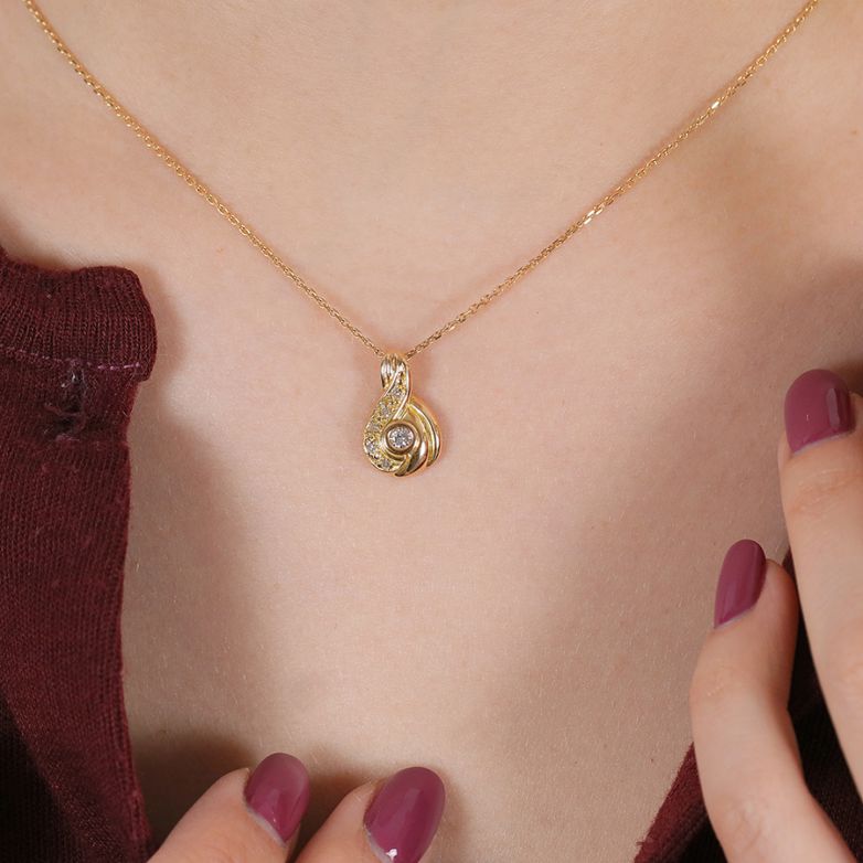 0.11-carat diamond pendant,...