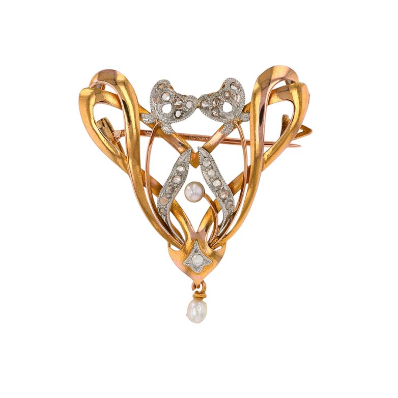 Antique brooch in two-tone...