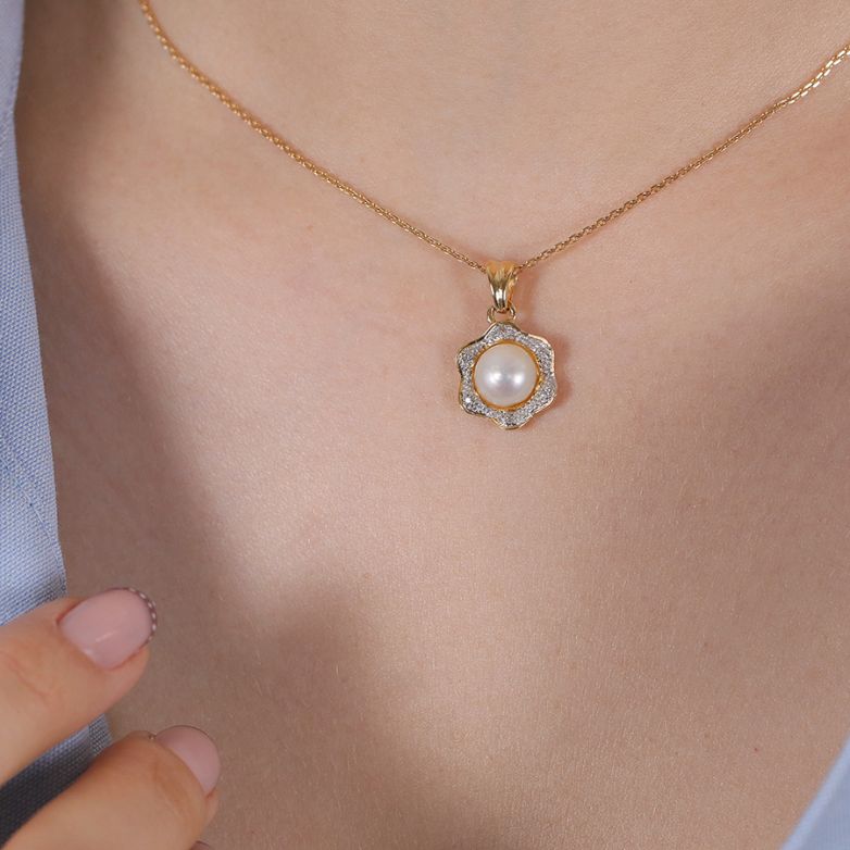 Pearl and diamond pendant,...